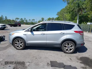 2016 Ford Escape Titanium with VIN 1FMCU0JX2GUC39416, listed as a IAAI auction lot 41793375 with 146,877 mi miles. Bid and sale history available at carsss.com. Image 14.