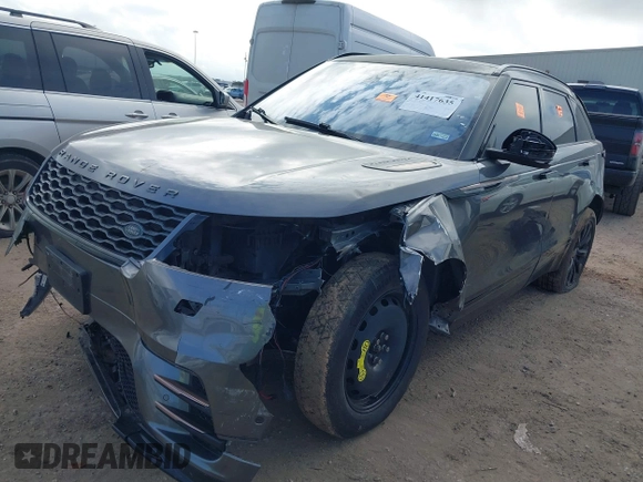 2018 Land Rover Range Rover Velar R-Dynamic SE z VIN SALYL2RX0JA758835, wystawiony jako IAAI lot #41417635 z przebiegiem 84 212 mil mil oraz . Historia ofert i sprzedaży dostępna na DreamBid. Obrazek 2.