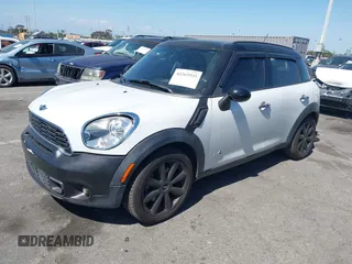 2012 MINI Countryman S with VIN WMWZC5C54CWM11869, listed as a IAAI auction lot 42265935 with 100,102 mi miles and . Bid and sale history available at DreamBid. Image 2.