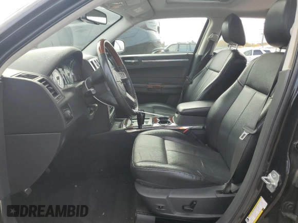 2009 Chrysler 300 with VIN 2C3LK33V19H614083, listed as a Copart auction lot 77529014 with 188,125 mi miles and Salvage title. Bid and sale history available at DreamBid. Image 7.
