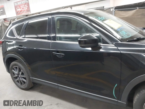 2018 Mazda CX-5 Grand Touring z VIN JM3KFADMXJ0311101, wystawiony jako IAAI lot #42163070 z przebiegiem 129 284 mil mil oraz . Historia ofert i sprzedaży dostępna na DreamBid. Obrazek 14.