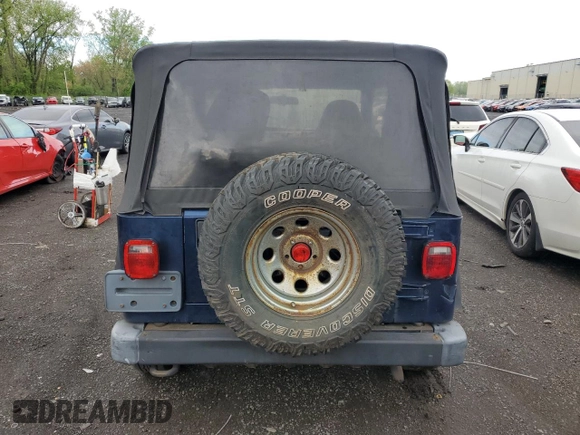 2002 Jeep Wrangler X z VIN 1J4FA39S32P767598, wystawiony jako Copart lot #55974555 z przebiegiem 177 793 mil mil oraz Czysty tytuł • Clean title. Historia ofert i sprzedaży dostępna na DreamBid. Obrazek 6.