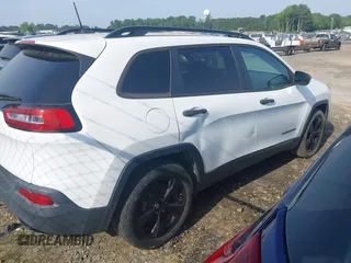 2016 Jeep Cherokee Altitude with VIN 1C4PJLABXGW323881, listed as a IAAI auction lot 42289189 with 147,631 mi miles and . Bid and sale history available at DreamBid. Image 4.