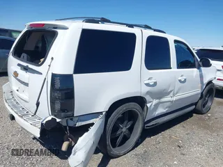2012 Chevrolet Tahoe LS with VIN 1GNSCAE06CR141256, listed as a IAAI auction lot 41806708 with 105,984 mi miles and . Bid and sale history available at DreamBid. Image 4.