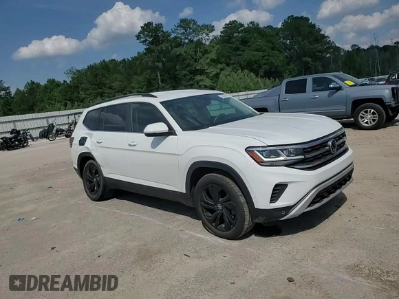 2022 Volkswagen Atlas SE z VIN 1V2HR2CA3NC528032, wystawiony jako Copart lot #57607665 z przebiegiem 34 714 mil mil oraz Czysty tytuł • Clean title. Historia ofert i sprzedaży dostępna na DreamBid. Obrazek 14.