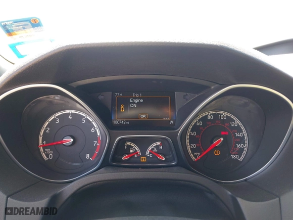 2015 Ford Focus ST with VIN 1FADP3L98FL292289, listed as a IAAI auction lot 41670338 with 100,742 mi miles. Bid and sale history available at carsss.com. Image 7.