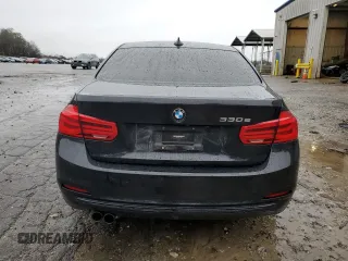 2018 BMW 3 Series 330e iPerformance with VIN WBA8E1C59JA177947, listed as a Copart auction lot 44696215 with 69,231 mi miles and Salvage Title. Bid and sale history available at carsss.com. Image 6.
