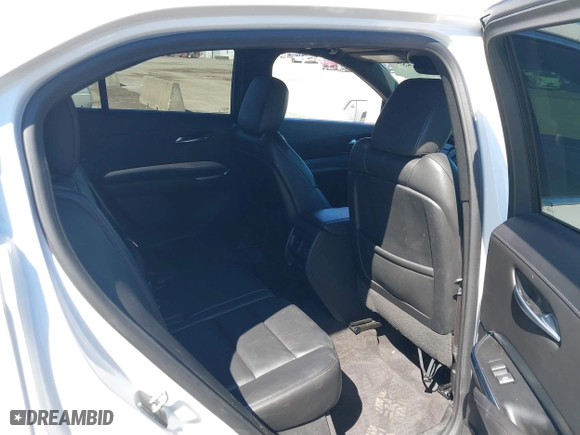 2020 Cadillac XT4 FWD Premium Luxury with VIN 1GYFZCR45LF138622, listed as a IAAI auction lot 41764535 with 99,079 mi miles. Bid and sale history available at carsss.com. Image 8.