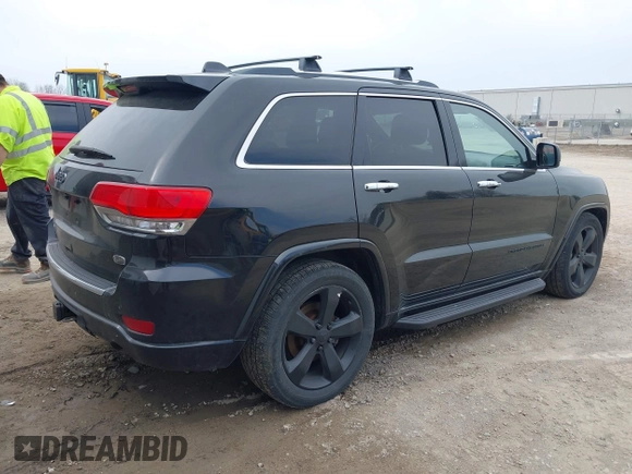 2014 Jeep Grand Cherokee Overland with VIN 1C4RJFCM8EC486259, listed as a IAAI auction lot 42105296 with 129,342 mi miles. Bid and sale history available at carsss.com. Image 4.