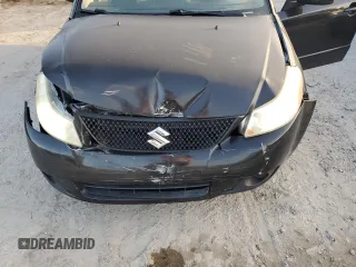 2011 Suzuki SX4 LE with VIN JS2YC5A29B6301704, listed as a Copart auction lot 79430574 with 173,287 mi miles and Salvage Title. Bid and sale history available at carsss.com. Image 11.