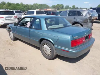 1995 Buick Regal Custom with VIN 2G4WB12LXS1457371, listed as a IAAI auction lot 42145890 with 100,243 mi miles and . Bid and sale history available at DreamBid. Image 3.