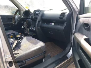 2002 Honda CR-V LX with VIN JHLRD68432C013805, listed as a IAAI auction lot 41890509 with 367,650 mi miles and . Bid and sale history available at carsss.com. Image 5.