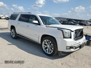 2020 GMC Yukon XL Denali with VIN 1GKS1HKJ1LR303285, listed as a Copart auction lot 71786914 with 132,278 mi miles and Salvage Title. Bid and sale history available at carsss.com. Image 4.