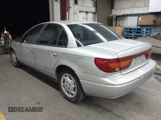 2002 Saturn SL with VIN 1G8ZK54762Z143727, listed as a IAAI auction lot 42441687 with 102,722 mi miles and . Bid and sale history available at DreamBid. Image 3.