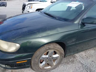 2000 Cadillac Catera z VIN W06VR54R0YR002664, wystawiony jako IAAI lot #41857553 z przebiegiem 86 354 mil mil oraz . Historia ofert i sprzedaży dostępna na DreamBid. Obrazek 12.