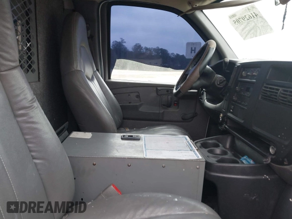 2007 Chevrolet Express Cargo with VIN 1GCGG25V771104970, listed as a IAAI auction lot 41629705 with 235,031 mi miles and . Bid and sale history available at DreamBid. Image 5.