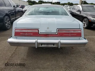 1977 Ford Thunderbird z VIN 7G87S303225, wystawiony jako Copart lot #74216404 z przebiegiem 48 305 mil mil oraz Szkody całkowita. Historia ofert i sprzedaży dostępna na DreamBid. Obrazek 6.
