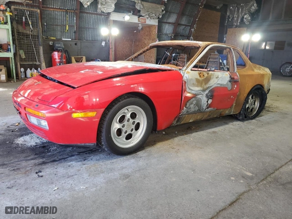 1986 Porsche 944 with VIN WP0AA0958GN152718, listed as a Copart auction lot 77900104 with 0 mi miles and Salvage Title. Bid and sale history available at carsss.com. Image 1.