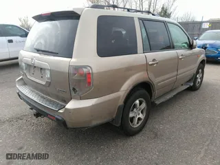 2006 Honda Pilot EX-L with VIN 2HKYF18556H523873, listed as a IAAI auction lot 41907028 with 226,072 mi miles. Bid and sale history available at carsss.com. Image 4.