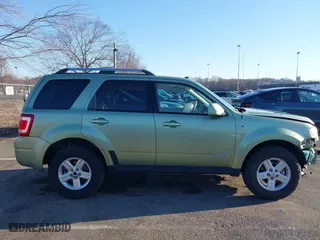 2008 Ford Escape Hybrid with VIN 1FMCU49H78KA72262, listed as a IAAI auction lot 41747610 with 145,588 mi miles. Bid and sale history available at carsss.com. Image 13.