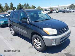 2001 Toyota RAV4 with VIN JTEGH20V710021536, listed as a IAAI auction lot 42653203 with 273,897 mi miles and . Bid and sale history available at DreamBid. Image 1.