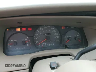 2004 Mercury Grand Marquis GS with VIN 2MEFM74W44X659873, listed as a Copart auction lot 51793205 with 115,384 mi miles and Salvage Title. Bid and sale history available at DreamBid. Image 9.