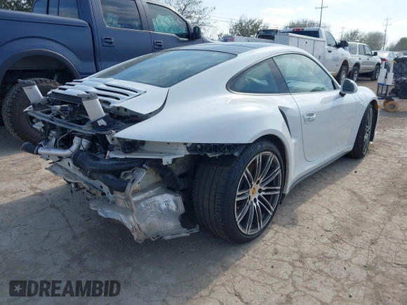 2016 Porsche 911 Turbo with VIN WP0AD2A97GS166077, listed as a IAAI auction lot 41568972 with 26,064 mi miles. Bid and sale history available at carsss.com. Image 4.