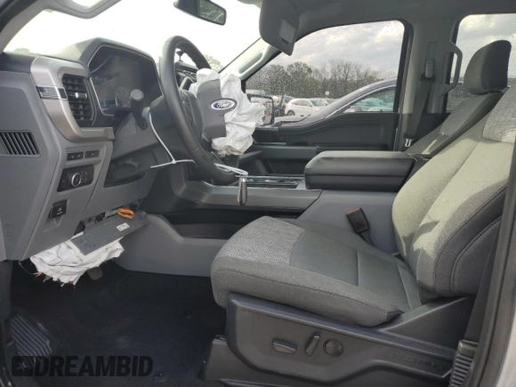 2023 Ford F-150 XL with VIN 1FTEW1C50PKF91124, listed as a Copart auction lot 51538865 with 22,128 mi miles and Salvage title. Bid and sale history available at DreamBid. Image 7.