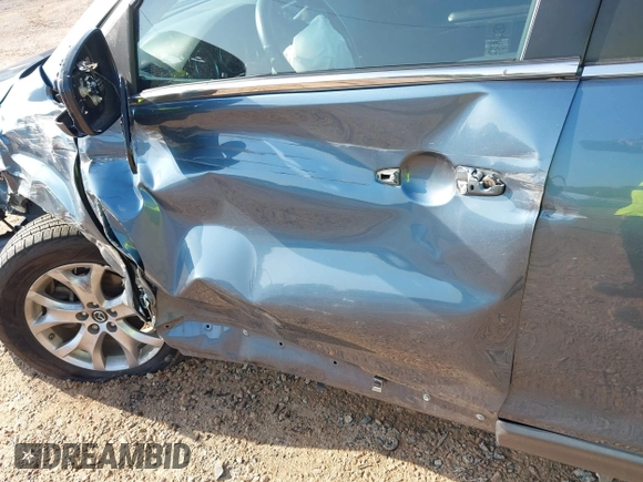 2014 Mazda CX-9 Touring with VIN JM3TB3CV7E0435659, listed as a IAAI auction lot 42428247 with 124,523 mi miles and . Bid and sale history available at DreamBid. Image 6.