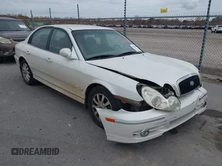 2002 Hyundai Sonata GLS with VIN KMHWF35HX2A523401, listed as a IAAI auction lot 41502680 with 176,283 mi miles. Bid and sale history available at carsss.com. Image 6.