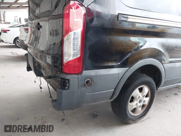 2017 Ford Transit with VIN 1FTYR2CM9HKB54645, listed as a IAAI auction lot 42077322 with 130,590 mi miles. Bid and sale history available at carsss.com. Image 18.
