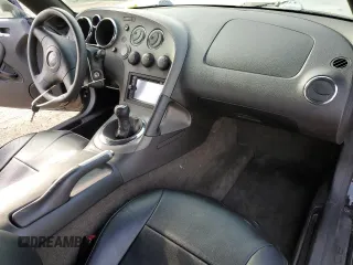 2006 Pontiac Solstice z VIN 1G2MB33B96Y106939, wystawiony jako Copart lot #51606095 z przebiegiem 91 707 mil mil oraz Szkoda całkowita • Salvage title. Historia ofert i sprzedaży dostępna na DreamBid. Obrazek 8.