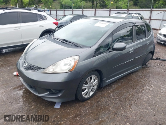 2011 Honda Fit Sport z VIN JHMGE8H51BC003715, wystawiony jako IAAI lot #42108476 z przebiegiem 174 228 mil mil oraz . Historia ofert i sprzedaży dostępna na DreamBid. Obrazek 2.