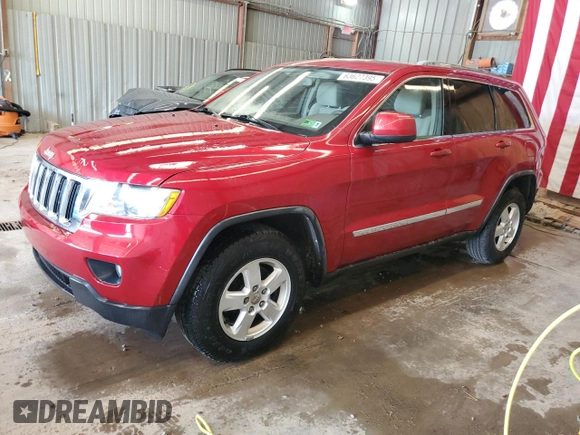 2011 Jeep Grand Cherokee Laredo with VIN 1J4RR4GG3BC669561, listed as a Copart auction lot 63627395 with 99,211 mi miles and Salvage title. Bid and sale history available at DreamBid. Image 1.