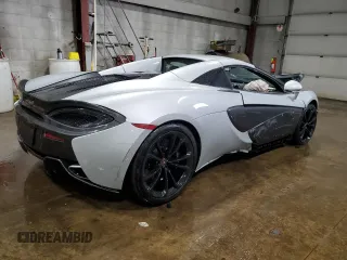 2018 McLaren 570S z VIN SBM13FAA2JW004594, wystawiony jako Copart lot #49730155 z przebiegiem Nie podano mil oraz Szkody całkowita. Historia ofert i sprzedaży dostępna na DreamBid. Obrazek 3.