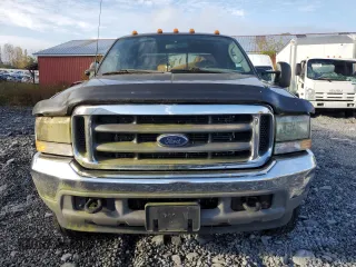 2003 Ford F-450 XL with VIN 1FDXW46P13EC18704, listed as a Copart auction lot 73657814 with 153,552 mi miles and Salvage Title. Bid and sale history available at carsss.com. Image 5.