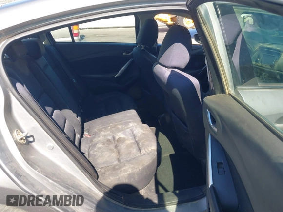 2014 Mazda 6 i Sport with VIN JM1GJ1U61E1151348, listed as a IAAI auction lot 42248173 with 275,764 mi miles and . Bid and sale history available at DreamBid. Image 8.