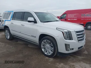 2018 Cadillac Escalade ESV Platinum z VIN 1GYS4KKJ5JR361939, wystawiony jako IAAI lot #41648559 z przebiegiem 101 360 mil mil oraz . Historia ofert i sprzedaży dostępna na DreamBid. Obrazek 1.