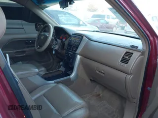 2006 Honda Pilot EX-L with VIN 5FNYF28586B005602, listed as a IAAI auction lot 41247326 with 221,698 mi miles and . Bid and sale history available at DreamBid. Image 5.
