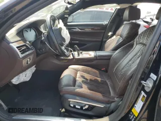 2017 BMW 7 Series 750i xDrive with VIN WBA7B0C57HG527064, listed as a Copart auction lot 62463405 with 103,454 mi miles and Salvage title. Bid and sale history available at DreamBid. Image 7.