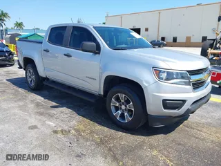 2020 Chevrolet Colorado 2WD Work Truck with VIN 1GCGSBEA1L1105425, listed as a IAAI auction lot 42150316 with 154,623 mi miles. Bid and sale history available at carsss.com. Image 1.