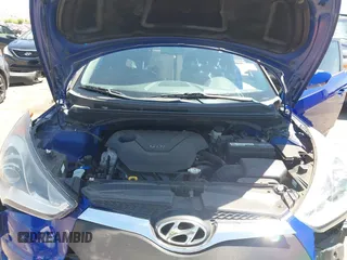 2013 Hyundai Veloster w/Gray Int z VIN KMHTC6AD3DU134956, wystawiony jako IAAI lot #42560944 z przebiegiem 108 166 mil mil oraz . Historia ofert i sprzedaży dostępna na DreamBid. Obrazek 10.