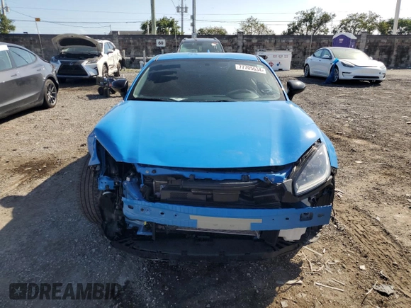 2023 Toyota GR86 with VIN JF1ZNBC11P8758861, listed as a Copart auction lot 77705634 with 11,684 mi miles and Salvage Title. Bid and sale history available at carsss.com. Image 5.