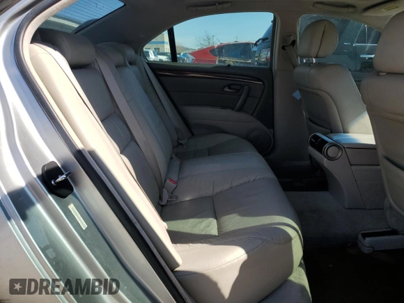 2007 Acura RL Technology z VIN JH4KB16677C001125, wystawiony jako Copart lot #46943485 z przebiegiem 191 097 mil mil oraz Szkoda całkowita • Salvage title. Historia ofert i sprzedaży dostępna na DreamBid. Obrazek 10.