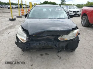 2012 Ford Focus SE with VIN 1FAHP3F25CL170193, listed as a Copart auction lot 58075895 with 180,689 mi miles and Salvage title. Bid and sale history available at DreamBid. Image 5.