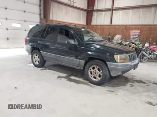 2001 Jeep Grand Cherokee Laredo z VIN 1J4GW48SX1C691946, wystawiony jako IAAI lot #42468388 z przebiegiem 162 310 mil mil oraz . Historia ofert i sprzedaży dostępna na DreamBid. Obrazek 1.