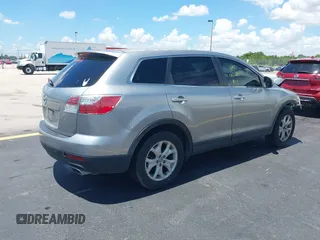 2011 Mazda CX-9 Sport with VIN JM3TB2BA3B0308508, listed as a IAAI auction lot 42517371 with 139,986 mi miles and . Bid and sale history available at DreamBid. Image 4.
