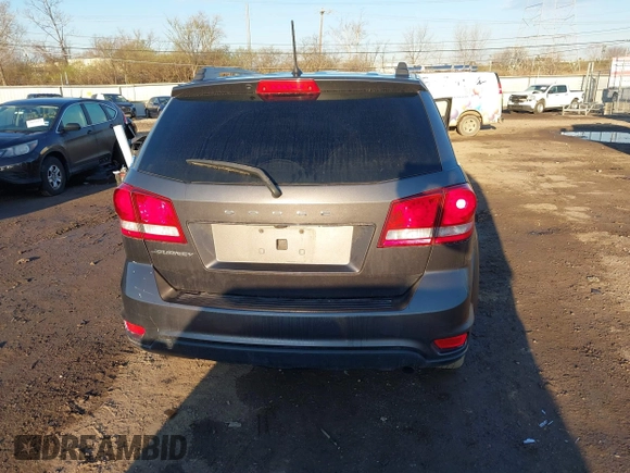 2019 Dodge Journey SE with VIN 3C4PDCBB2KT873970, listed as a IAAI auction lot 41864725 with 91,240 mi miles and . Bid and sale history available at DreamBid. Image 16.