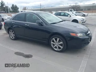 2004 Acura TSX w/Navigation with VIN JH4CL96974C043235, listed as a IAAI auction lot 41793630 with 147,069 mi miles. Bid and sale history available at carsss.com. Image 1.