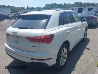 2021 Audi Q3 S line Premium Plus with VIN WA1EECF32M1047731, listed as a IAAI auction lot 39714835 with 15,939 mi miles and . Bid and sale history available at DreamBid. Image 4.